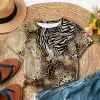 T shirt léopard et zébré femme